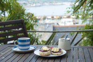 Cornish cream tea outside by the sea